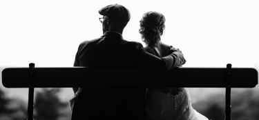 Old couple sitting together