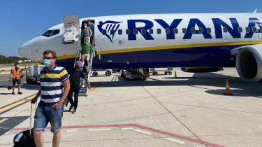 Man traveling with covid mask